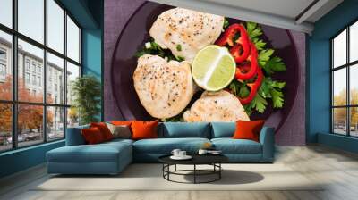 chicken breasts with parsley and citrus top view. healthy food. Wall mural