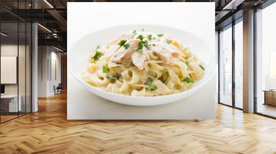 Pasta fettuccine alfredo with chicken, parmesan and parsley on white background close up. Italian cuisine. Wall mural