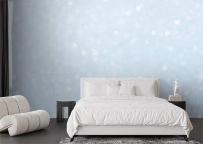 Unfocused abstract light blue glitter bokeh holiday background. Winter xmas holidays. Christmas. Wall mural