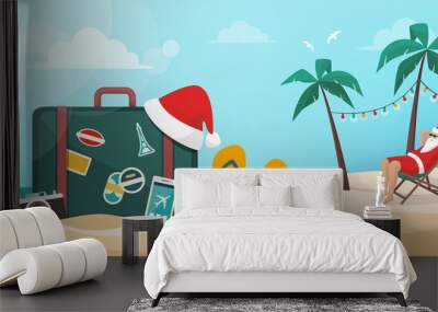 Santa Claus having a vacation on the beach Wall mural