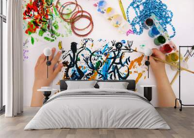 Child creativity. Painting with mixed media with abstract lines paints, abstract silhouettes dancing girls in an Indian costume, freehand lines Wall mural