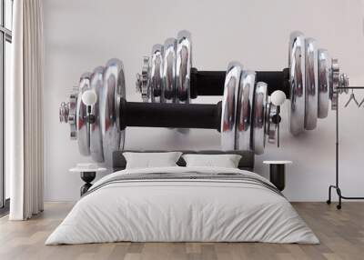 Fitness exercise equipment dumbbell weights on white background Wall mural