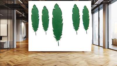 White stencil with cut leaves on green craft paper. Wall mural