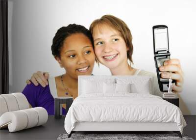 Teen girls with camera phone Wall mural