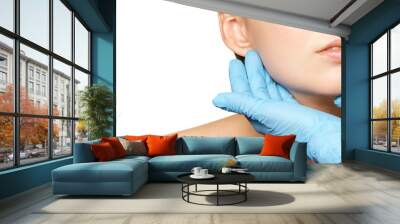 Facelift hydra treats. Esthetic skin care analysis. Doctor hands in gloves. Wall mural