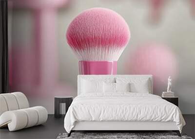 Soft pink makeup brush on pastel backdrop Wall mural