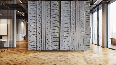 The background of the tread pattern of the car wheel. Rubber tir Wall mural