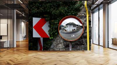 Street sign and mirror in Sinaia, Prahova Valley, Romania. Wall mural