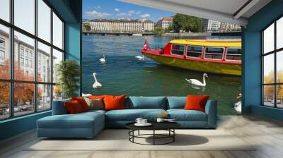 view of geneva lake with boat transportation and swans in geneva harbor,switzerland Wall mural