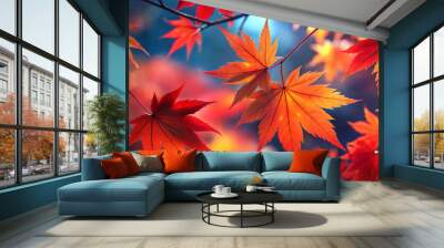 Vibrant autumn leaves in shades of red and orange against a blurred background for seasonal decoration and nature appreciation. Wall mural