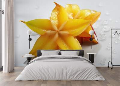 Fresh star fruit, carambola with water drops on a white background, top view Wall mural