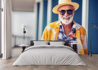 Happy stylish mature older adult senior man, dressed in vibrant, fashionable clothes sunglasses. Smiling stylish middle aged senior enjoying resting, joy of retirement, age is just a number concept Wall mural