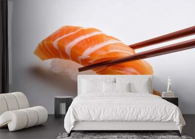 Sashimi with chopsticks on white background isolated Wall mural