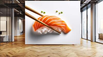 Sashimi with chopsticks on white background isolated Wall mural