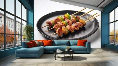 Yakitori on black plate with white background isolated Wall mural