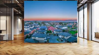 Panoramic aerial Drone view of Melbournes suburbs and CBD looking down at Houses roads and Parks Victoria Australia Wall mural