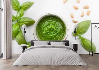 a fresh pesto sauce in a small bowl, isolated on a white background, with pine nuts and basil leaves arranged around it create with ai Wall mural