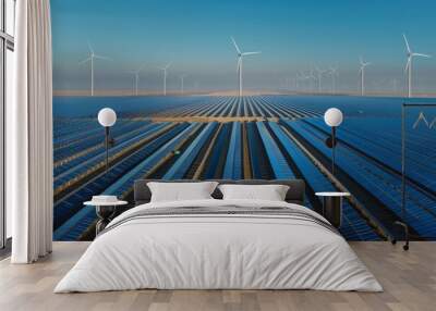 A sprawling solar farm with rows of solar panels and wind turbines stretching towards the horizon Wall mural