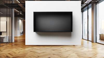 An open black box sits on a flat, light-colored surface, showcasing its interior and design in detail from a top-down perspective Wall mural