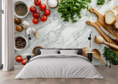 Fresh ingredients like tomatoes, spices, herbs, and eggs are arranged on a marble countertop ready for cooking in a warm kitchen atmosphere Wall mural