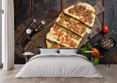 Kiymali Pide Turkish Traditional Pastry Food, on old dark  wooden table background, top view flat lay Wall mural