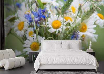 Midsummer in Latvia: celebration of Ligo in june decorating home with field flower bouquet Wall mural