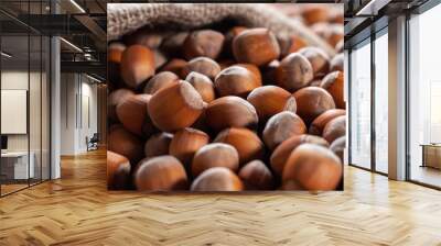 Hazelnuts, filbert on old wooden table. heap or stack of hazel nuts. Hazelnut background, healty food Wall mural