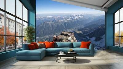 The lower platform with terraces at Aiguille du Midi above the french town of Chamonix Wall mural