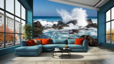 Ocean waves crashing against rocks at Hawaii beach Wall mural