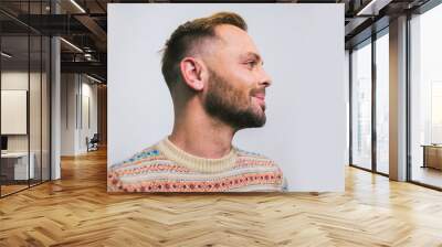 Portrait of a young caucasian stylish and fashionable man with a beard. Homosexual man, gay model posing Wall mural