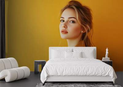 Elegant Caucasian businesswoman against the backdrop of yellow in the studio Wall mural