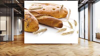 Fresh bread with ears of wheat on isolated.. Wall mural