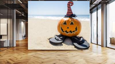 Beach Halloween background with pumpkin in the witch's hats Wall mural