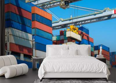 Containers are being discharged from a large container ship by a crane in the port of Rotterdam, Europe Wall mural