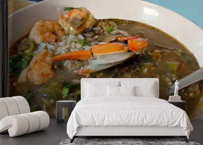 Seafood gumbo with rice, crab and shrimp in a bowl isolated close up Wall mural