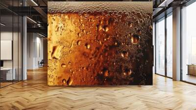 Close-up of condensation on a glass of brown liquid Wall mural