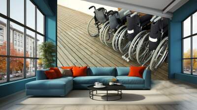 Wheelchairs in a row Wall mural