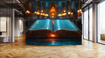 Open Holy bible book with glowing lights in church Wall mural