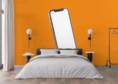 Smartphone similar to iPhone Metal frameless blank screen mockup template with shadow isolated on orange background Wall mural