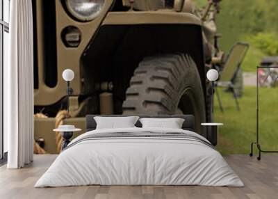 Close up of world war 2 jeep - wheel and headlight Wall mural