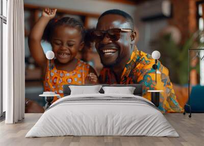 African father and his little son and daughter dancing in a cozy living room, enjoying life and fooling around while listening to cool music, screaming with happiness and partying hard. Wall mural