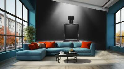 A bottle of men's cologne is shown against a black and white backdrop. Wall mural