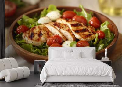 A fresh salad with grilled chicken, mozzarella cheese, and juicy cherry tomatoes. Wall mural