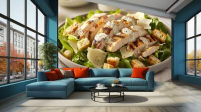 A refreshing salad with crisp lettuce, crunchy croutons, and flavorful grilled chicken. It's topped with creamy Caesar dressing and sprinkled with savory Parmesan cheese. Wall mural