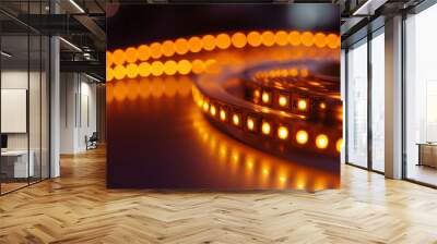 A roll of LED lights that produce an orange glow. Wall mural