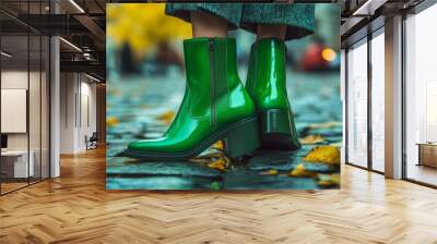 Stylish green boots are a trendy fashion choice for the fall and spring seasons. Wall mural