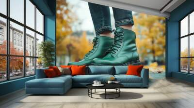 Stylish green boots are a trendy fashion choice for the fall and spring seasons. Wall mural