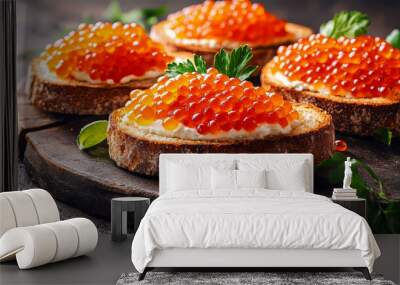 Three sandwiches with red caviar are ready to eat.  A tasty appetizer features trout caviar on bread with cream cheese.  Salty salmon caviar is a popular choice for fish lovers. Wall mural