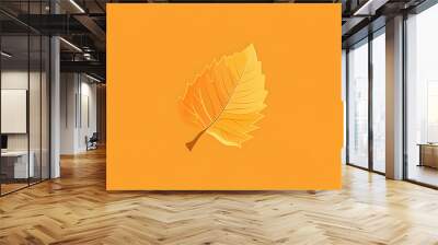 A single yellow leaf on an orange background, symbolizing autumn. Wall mural