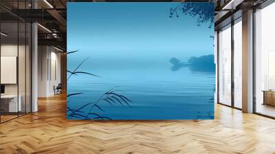 Tranquil lake with a gentle breeze. The blue water is still and clear. The sky is a light blue and the sun is shining. Wall mural